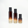 Amber glass bottle 100ml Cosmetic Glass Bottle With Plastic pump round amber glass bottle 