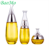 Recyclable Round Gold Glass Lotion Bottle