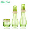 Electroplating Green Cosmetic Glass Bottle With Bamboo Lids